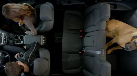 2013 GMC Acadia SLE-1 TV Spot, 'Backseat Dog' Song by Lenka featuring Jama Williamson