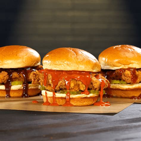 Buffalo Wild Wings Saucy Chicken Sandwich logo