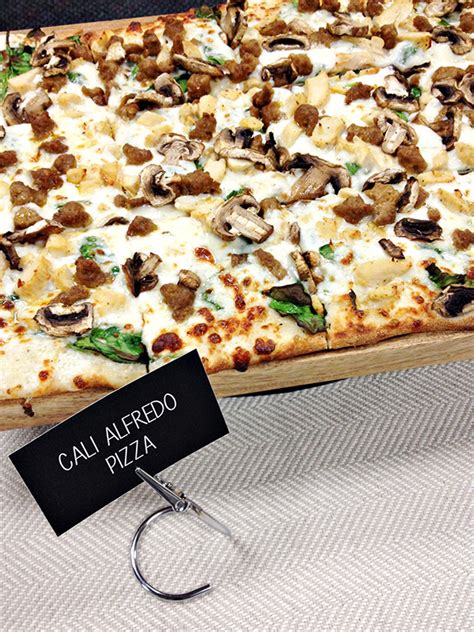 Chuck E. Cheese's Cali Alfredo Pizza logo