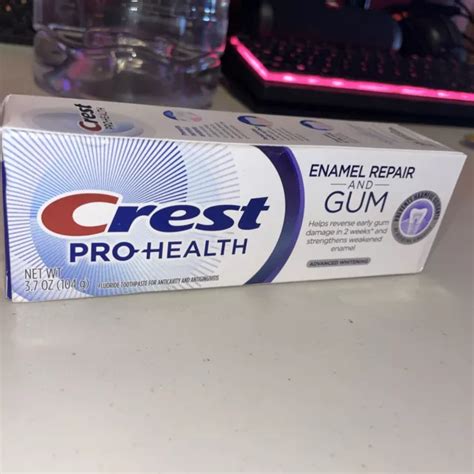 Crest Gum & Enamel Repair Advanced Whitening Toothpaste logo
