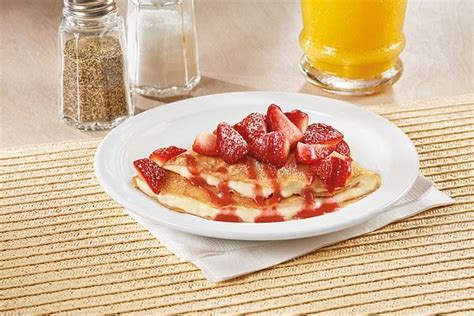 Denny's Strawberry Vanilla Crepe logo