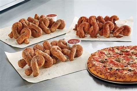 Domino's Garlic Bread Twists logo