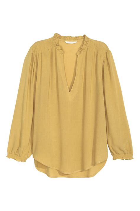 H&M Georgette Blouse logo