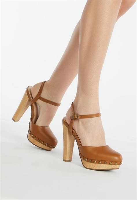 JustFab.com Maya Ankle-Strap Platform Pump logo