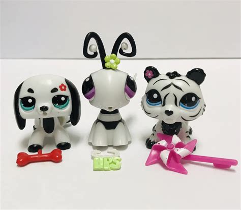 Littlest Pet Shop Black & White Pet Packs logo