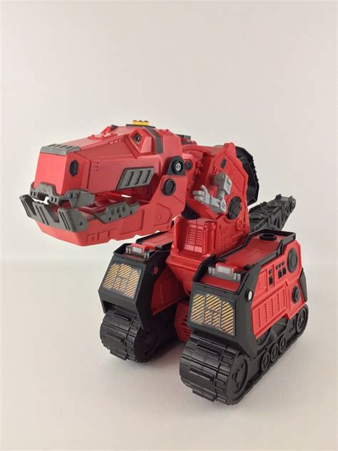 Mattel Dinotrux Mega Chompin' Ty Rux logo