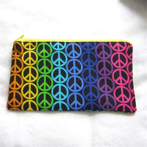 More Than Magic Zipper Pencil Pouch Silicone Peace logo