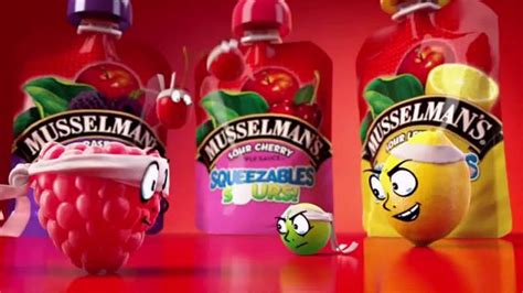 Musselman's Squeezable Sours Sour Raspberry logo