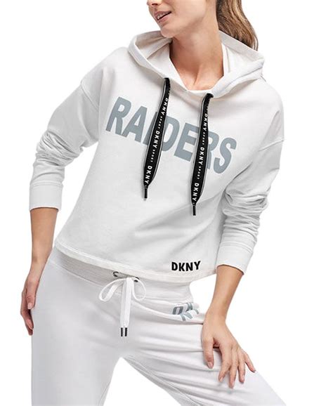 NFL Shop Women's Oakland Raiders DKNY Sport Black Maddie Crop Pullover Hoodie logo