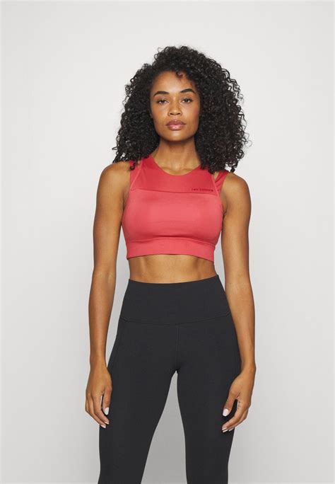 New Balance Shape Shield Crop Bra logo