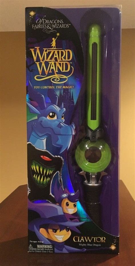 Of Dragons Fairies & Wizards Mighty Wizard Wand Clawtor the Mighty Blue Dragon logo