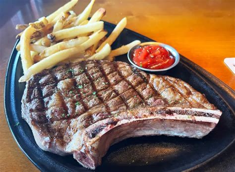 Outback Steakhouse Bone-In Ribeye logo