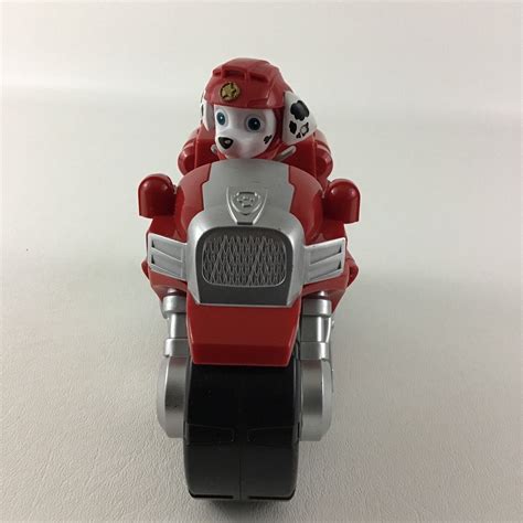 PAW Patrol Moto Pups Marshall’s Deluxe Pull Back Motorcycle logo