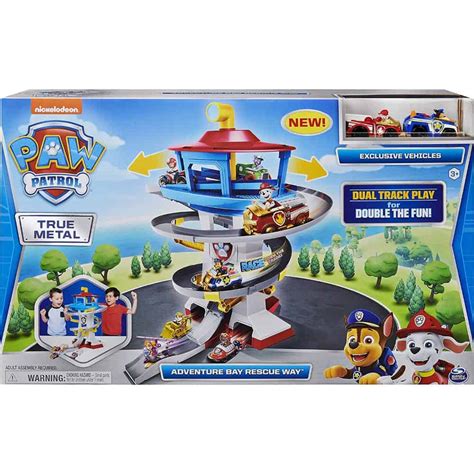 PAW Patrol True Metal Adventure Bay Rescue Way Playset logo