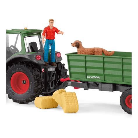 Schleich Farm World Tractor With Trailer logo