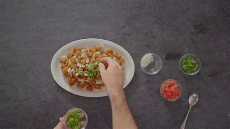 SeaPak Popcorn Shrimp TV Spot, 'Popcorn Shrimp Tot'chos' featuring Cam Cornelius