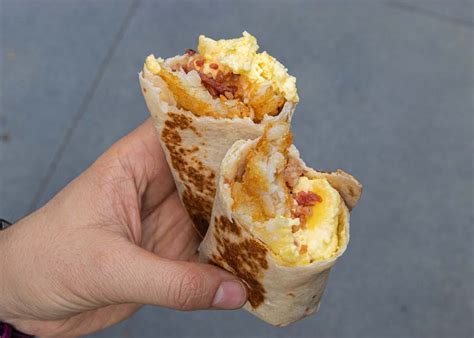 Taco Bell Cheesy Toasted Breakfast Burrito logo