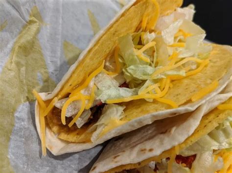 Taco Bell Chipotle Cheddar Double Stacked Taco logo