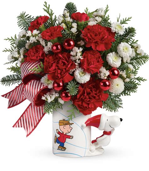 Teleflora Peanuts Christmas Mug Bouquet logo