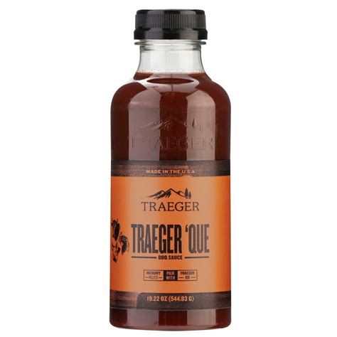 Traeger Pellet Grills, LLC 'Que BBQ Sauce logo