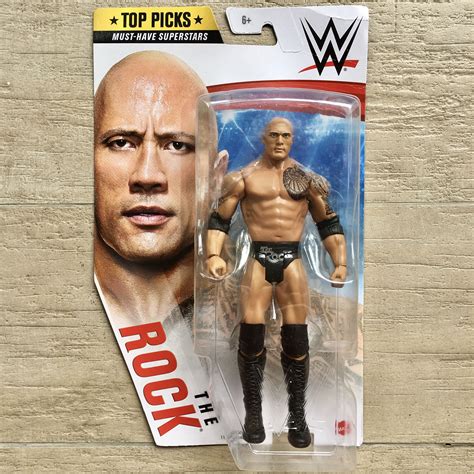 WWE (Mattel) The Rock Dwayne Johnson Top Picks Action Figure logo